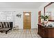 Inviting foyer with tile flooring, modern decor, decorative doorway, and a bright, airy feel at 7213 Trinity Pl, Tampa, FL 33610
