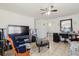 Open-concept living room with decorative tile floors, neutral walls and a modern design at 7213 Trinity Pl, Tampa, FL 33610