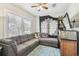 Relaxing living room with a comfortable sectional sofa and a colorful patterned rug at 8306 N 10Th St, Tampa, FL 33604