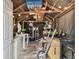 A look inside of the shed, showcasing its organized storage, laundry capabilities, and functional workspace at 8306 N 10Th St, Tampa, FL 33604