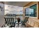 Balcony with seating overlooking a waterfront community at 936 Pinellas Bayway S # T-7, Tierra Verde, FL 33715