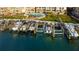 Aerial of condo boat lifts with direct water access to the bay and the community pool at 936 Pinellas Bayway S # T-7, Tierra Verde, FL 33715