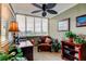 Bright office area with a ceiling fan, lots of natural light, comfortable chair, and desk at 936 Pinellas Bayway S # T-7, Tierra Verde, FL 33715