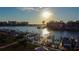 Aerial view of waterfront neighborhood with community docks at sunset at 936 Pinellas Bayway S # T-7, Tierra Verde, FL 33715