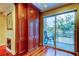 Bright room with beautiful cabinetry and glass doors leading to a private balcony at 936 Pinellas Bayway S # T-7, Tierra Verde, FL 33715