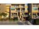 Exterior view of waterfront condos with multiple balconies at 936 Pinellas Bayway S # T-7, Tierra Verde, FL 33715