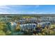 Aerial view of the condo community, golf course, and pond at 960 Starkey Rd # 3406, Largo, FL 33771