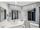 Modern bathroom featuring a sink with quartz countertop, decorative tile accents, and a framed mirror at 960 Starkey Rd # 3406, Largo, FL 33771