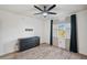 This bright bedroom has a ceiling fan and a large window to let in natural light at 960 Starkey Rd # 3406, Largo, FL 33771