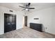 This bedroom features a modern ceiling fan and a large closet with wooden-look floors at 960 Starkey Rd # 3406, Largo, FL 33771
