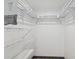 Walk-in closet featuring ample storage space with shelving and hanging rods for organized storage at 960 Starkey Rd # 3406, Largo, FL 33771