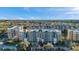 Beautiful condo building exterior with manicured landscaping at 960 Starkey Rd # 3406, Largo, FL 33771