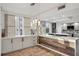 Modern kitchen with stainless steel appliances, sleek countertops, and lots of natural light at 960 Starkey Rd # 3406, Largo, FL 33771