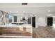 Spacious kitchen featuring quartz countertops, modern appliances, and wood flooring at 960 Starkey Rd # 3406, Largo, FL 33771