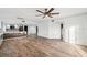 Open-concept living space showcasing a modern kitchen, hardwood floors, and ample natural light at 960 Starkey Rd # 3406, Largo, FL 33771