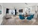 Bright open-concept living room featuring modern furnishings and stylish decor for a comfortable living space at 960 Starkey Rd # 3406, Largo, FL 33771