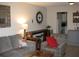 Open-concept living area with stylish seating, bar counter, and easy access to the kitchen at 9911 Dahlia N St # 38, Pinellas Park, FL 33782