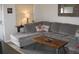 Comfortable living room featuring a large sectional sofa and decorative elements at 9911 Dahlia N St # 38, Pinellas Park, FL 33782