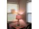 Comfortable sitting area with natural light streaming through woven blinds at 9911 Dahlia N St # 38, Pinellas Park, FL 33782