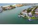 Stunning waterfront home with pool, boat dock, and bay access to a vibrant coastal community at 10100 Tarpon Dr, Treasure Island, FL 33706