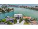 Beautiful waterfront property featuring a modern home, private dock, and gorgeous waterfront views at 10100 Tarpon Dr, Treasure Island, FL 33706
