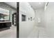A modern bathroom highlighting a luxurious shower and dual vanities with a stylish design at 10100 Tarpon Dr, Treasure Island, FL 33706