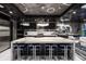 Gourmet kitchen with island seating and view to dining and living spaces at 10100 Tarpon Dr, Treasure Island, FL 33706
