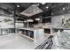 This is a gourmet kitchen with a large island, stainless steel appliances, and a breakfast bar at 10100 Tarpon Dr, Treasure Island, FL 33706