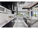 A gourmet kitchen offers stainless steel appliances and views of the water at 10100 Tarpon Dr, Treasure Island, FL 33706