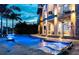 The uniquely designed pool with custom lighting makes for the perfect place to unwind in the evening at 10100 Tarpon Dr, Treasure Island, FL 33706