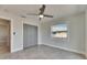 Bedroom featuring a ceiling fan, window, and closet space provides a comfortable and functional living area at 1025 Apollo Beach Blvd # 1, Apollo Beach, FL 33572