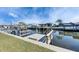 Real estate featuring a boat dock with a boat lift in a waterfront community at 1025 Apollo Beach Blvd # 1, Apollo Beach, FL 33572