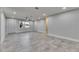 Large living room with tile floors, ceiling fan, and a window to let in natural light at 1025 Apollo Beach Blvd # 1, Apollo Beach, FL 33572