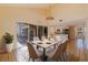 Bright dining space with sliding doors to the outdoor pool area at 1130 Serpentine S Dr, St Petersburg, FL 33705