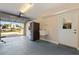 Garage features a sink, refrigerator, and access to the home at 1130 Serpentine S Dr, St Petersburg, FL 33705