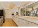 Spacious kitchen featuring light cabinets and granite countertops at 1130 Serpentine S Dr, St Petersburg, FL 33705