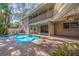 Enjoy the outdoors in this home's private pool and patio area at 1130 Serpentine S Dr, St Petersburg, FL 33705