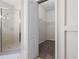 Bathroom with a walk-in shower and a door to a walk-in closet at 11611 Jordans Landing Ct, Riverview, FL 33569