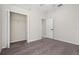 Neutral bedroom with a walk-in closet, light walls and carpet at 11611 Jordans Landing Ct, Riverview, FL 33569