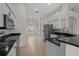 Stylish kitchen with granite countertops, stainless appliances, and an open layout at 11611 Jordans Landing Ct, Riverview, FL 33569