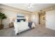 Beautiful bedroom with comfortable bed, soft lighting, and ensuite bathroom at 1200 Country Club Dr # 4301, Largo, FL 33771