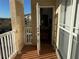 Balcony access showing the interior, balcony, and exterior view at 1216 S Missouri Ave # 321, Clearwater, FL 33756
