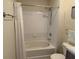 Clean bathroom featuring a shower and tub combo with a white shower curtain at 1216 S Missouri Ave # 321, Clearwater, FL 33756