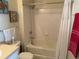 Bathroom featuring a shower and tub combo with a clean white shower curtain at 1216 S Missouri Ave # 321, Clearwater, FL 33756