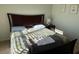 Inviting bedroom with a well-lit ambiance and a comfortable bed at 1216 S Missouri Ave # 321, Clearwater, FL 33756