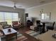 Comfortable living room with plenty of natural light and cozy seating arrangements at 1216 S Missouri Ave # 321, Clearwater, FL 33756