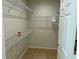 Spacious walk-in closet with shelving and ample storage space for an organized wardrobe at 1216 S Missouri Ave # 321, Clearwater, FL 33756