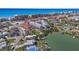 Aerial view of waterfront condo community, the beach, and beautiful waters at 125 Shoals Cir, North Redington Beach, FL 33708