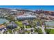 Aerial view of community showing the condo buildings, waterway and ocean at 125 Shoals Cir, North Redington Beach, FL 33708