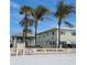 Community beach access with nearby covered seating area next to updated multi-Gathering housing at 125 Shoals Cir, North Redington Beach, FL 33708